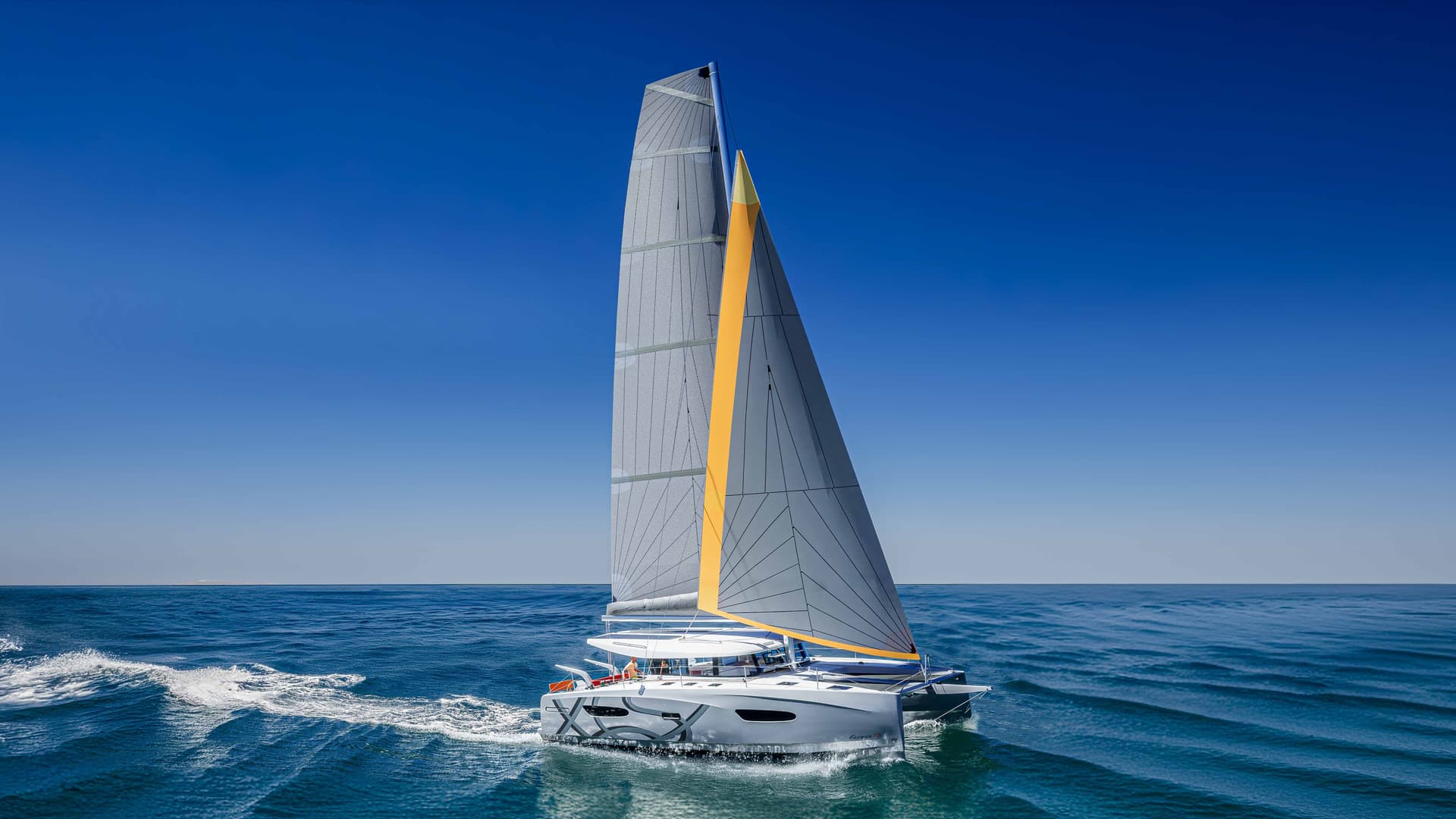Catamaran de croisière sous voiles en Méditerranée